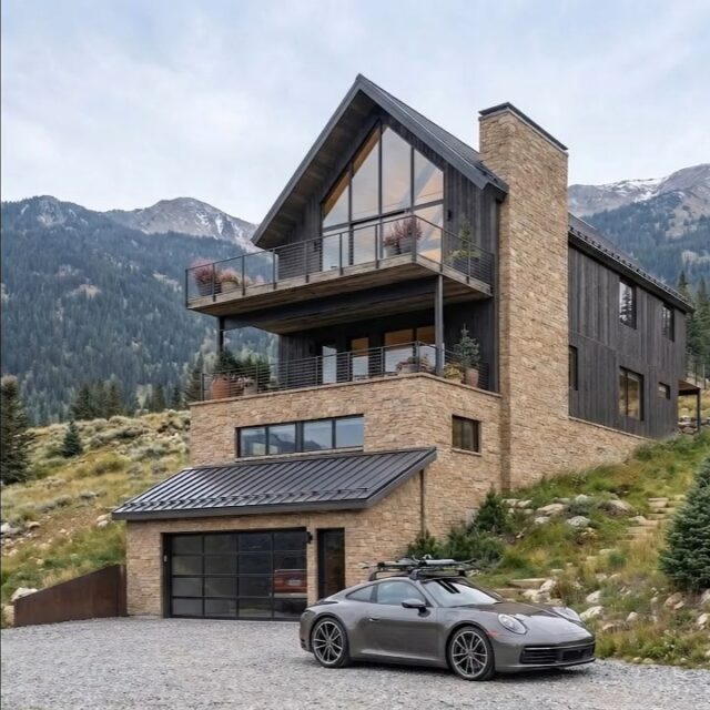 Elevated Living: Mountain Retreat Design

Designing a mountain retreat is an exercise in reverence. Our approach to high-altitude architecture focuses on creating a seamless dialogue between the sanctuary of the home and the sweeping, dramatic landscape outside. We design specifically to honor great mountain views, ensuring the wilderness actively participates in your daily life. We choreograph the procession of the home so that the peaks unfold before you in breathtaking, framed vistas as you move through the spaces. By using expansive glass, we treat the alpine light as a living building material that shifts beautifully from the crisp clarity of dawn to the deep amber of a mountain sunset. To ground the home in its rugged environment, we layer a rich, tactile palette of honest textures like native stone and steel beams. Every element is crafted to provide a deep sense of shelter and pure joy, turning the simple act of returning from the trails into a moment of profound gratitude—a warm, enduring backdrop for family memories high above the world.